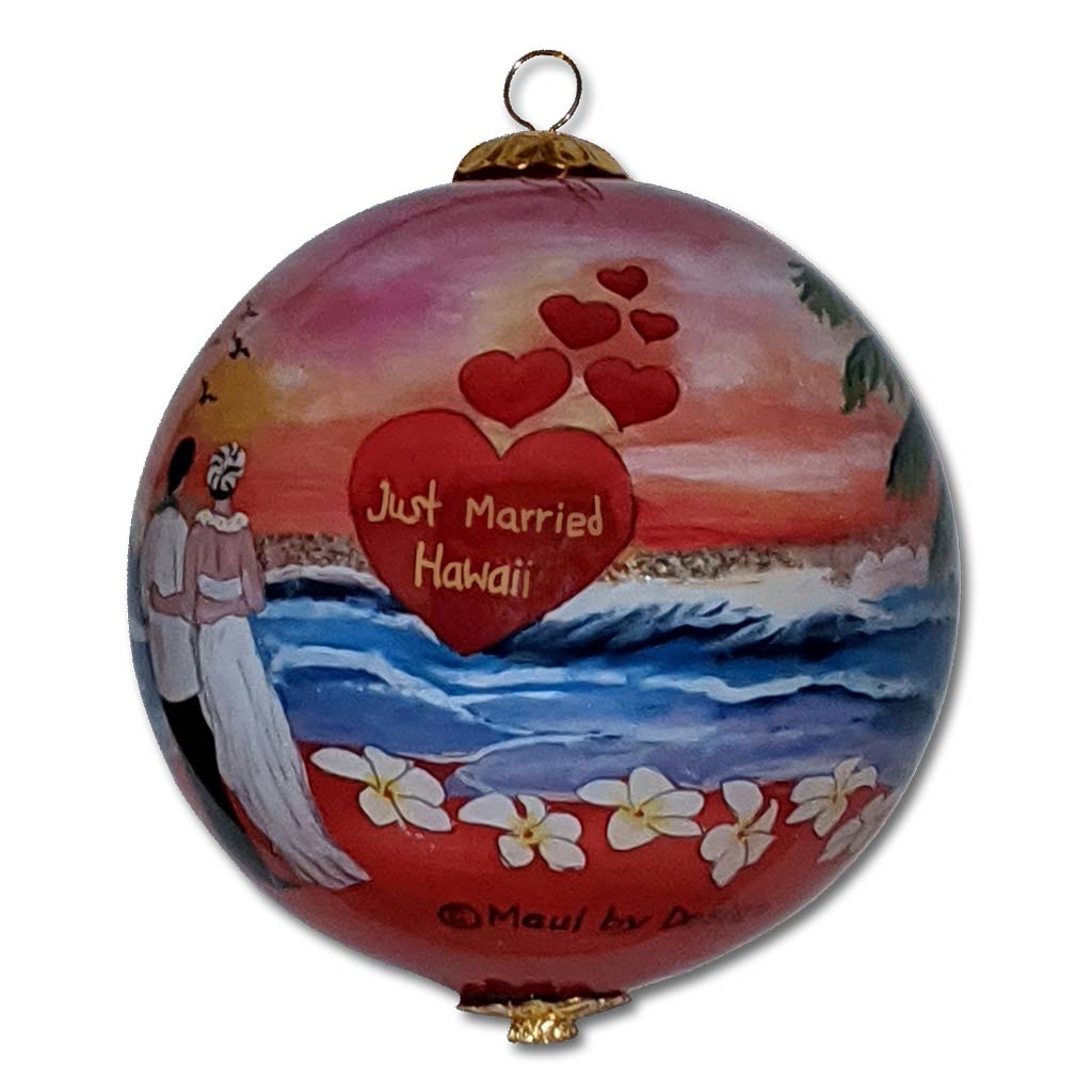 Just Married Hawaiian ornament with plumeria flowers during sunset