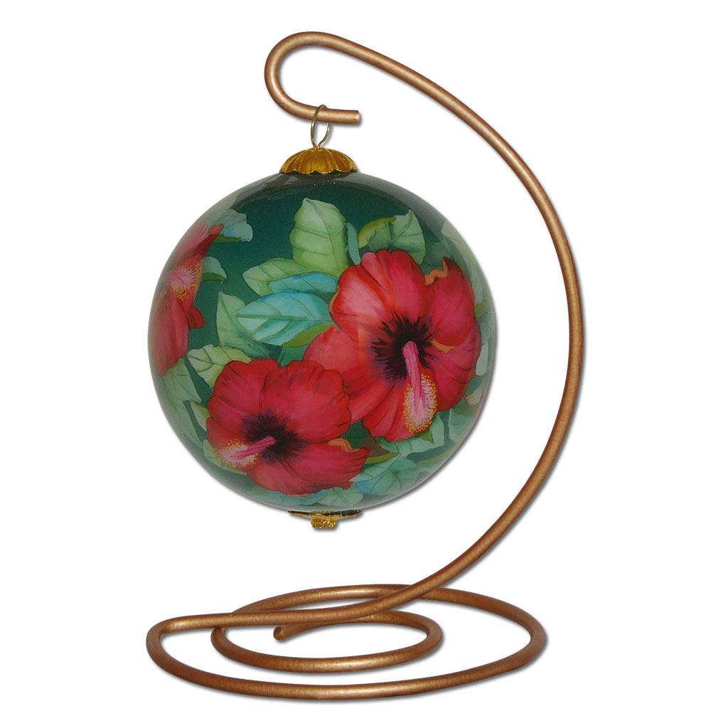 Beautiful hand painted Hawaiian Christmas ornament with red hibiscus flowers on a display stand