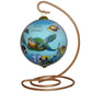 Hand painted Hawaiian Christmas ornament with sea turtle on a stand